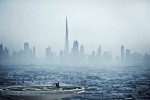 1.	Danny Torres of Spain rides his bike on the helipad of the Burj al Arab prior to the first stop the Red Bull X-Fighters World Tour in Dubai, United Arab Emirates on Wednesday, April 11.